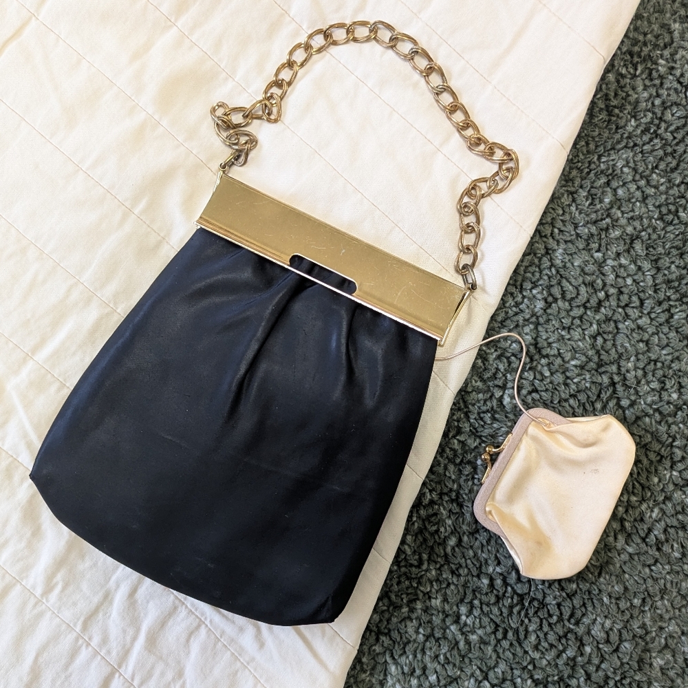 1940s black satin evening purse with metal clasp and attached coin wallet